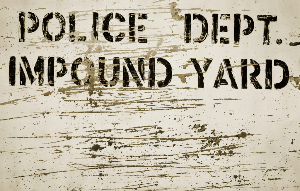 police dept impound yard sign